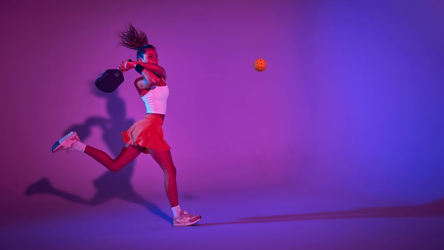 Six Zero 6.0 sponsored female athlete plays pickleball